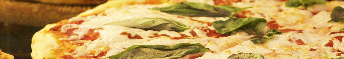 Eating Italian Pizza at Italian Village Pizza restaurant in Pittsburgh, PA.